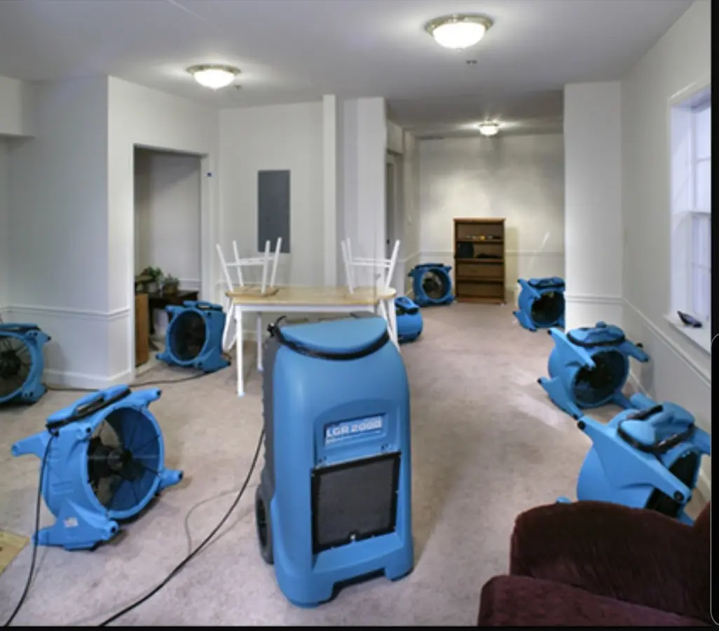 Air movers and dehumidifier setup for Water Damage Restoration in Longswamp